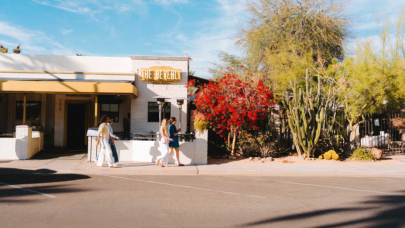 Wwomen walk in front of a Scottsdale restaurant, The Beverly