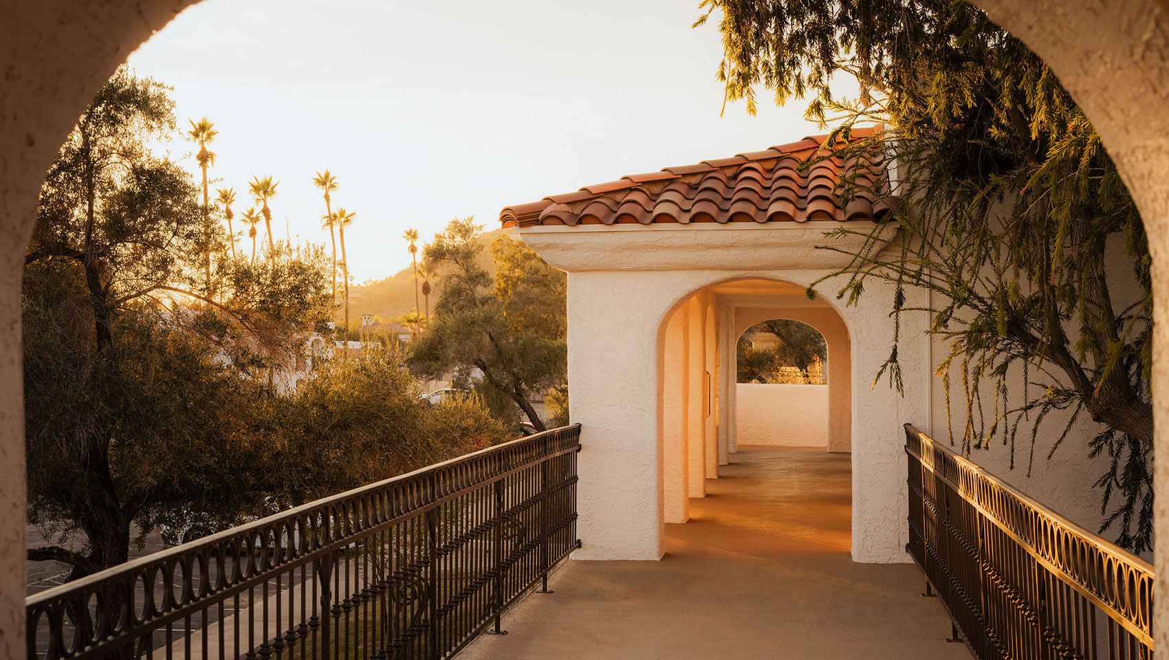 Kimpton Miralina guestroom featuring modern luxury design with warm desert-inspired textures