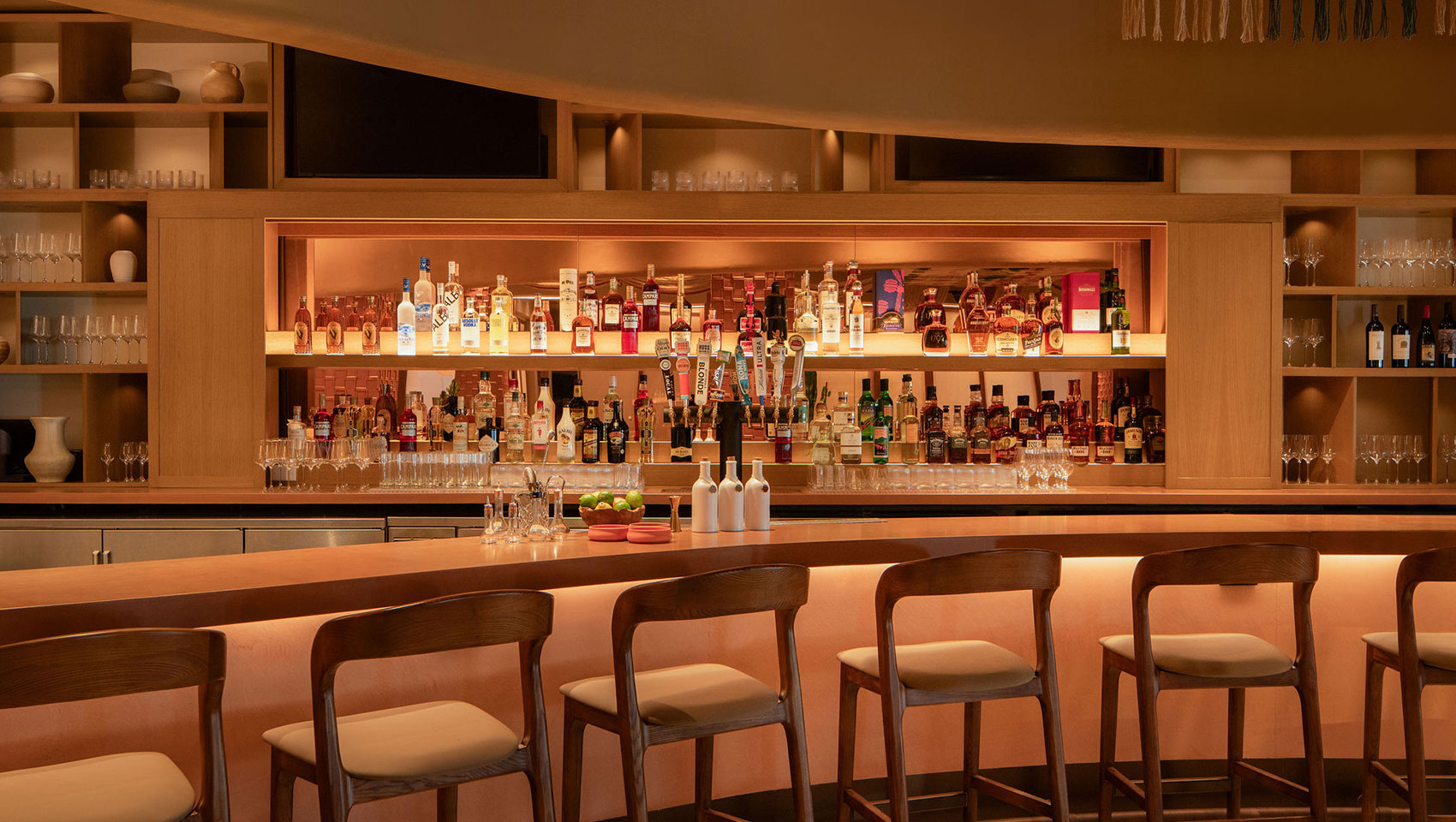 Hecho Libre dining room with natural light and refined décor at Kimpton Miralina