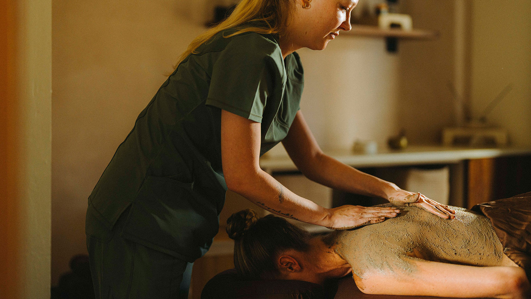 woman giving massage at Kimpton Miralina