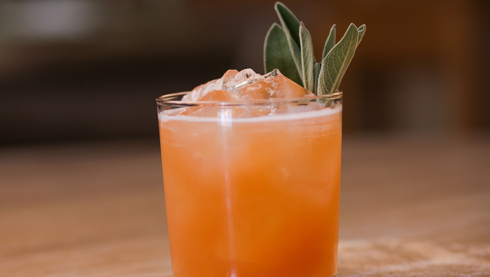 cocktail with leafy garnish