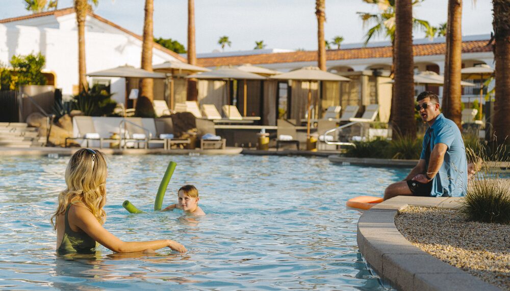 Family in the pool at Kimpton Miralina