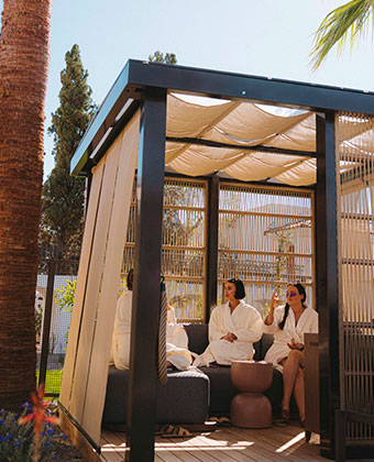 women sitting in an outdoor area at Miralina