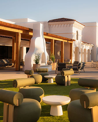 Kimpton Miralina resort pool lounge with desert landscape views and outdoor amenities