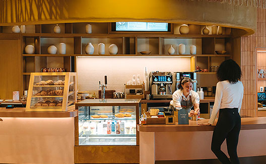 Woman ordering at Café Libre