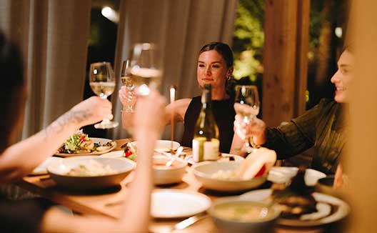 women at dinner at Kimpton miralina