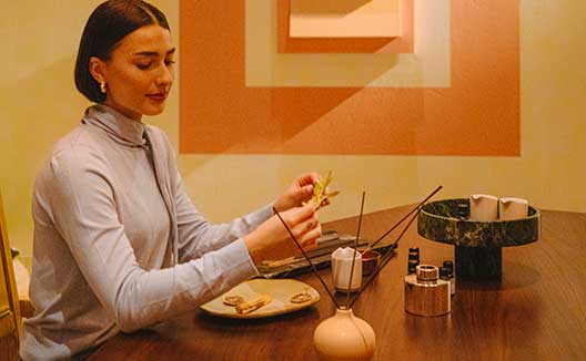 Woman eating at Miralina