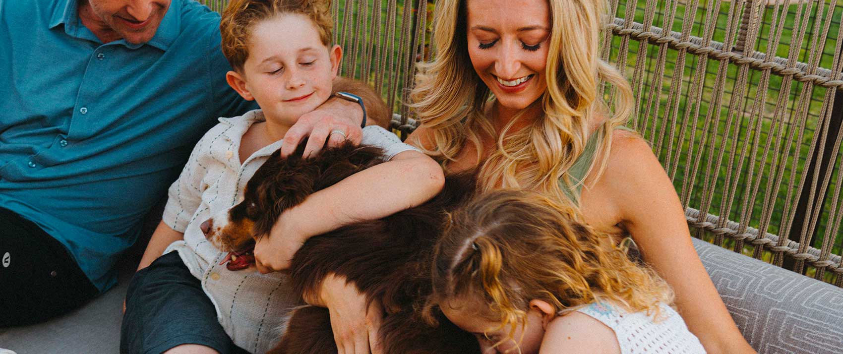 family with dog at kimpton miralina